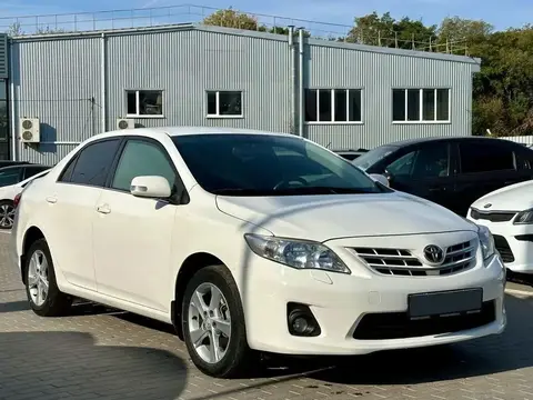 Королла E140 рестайлинг